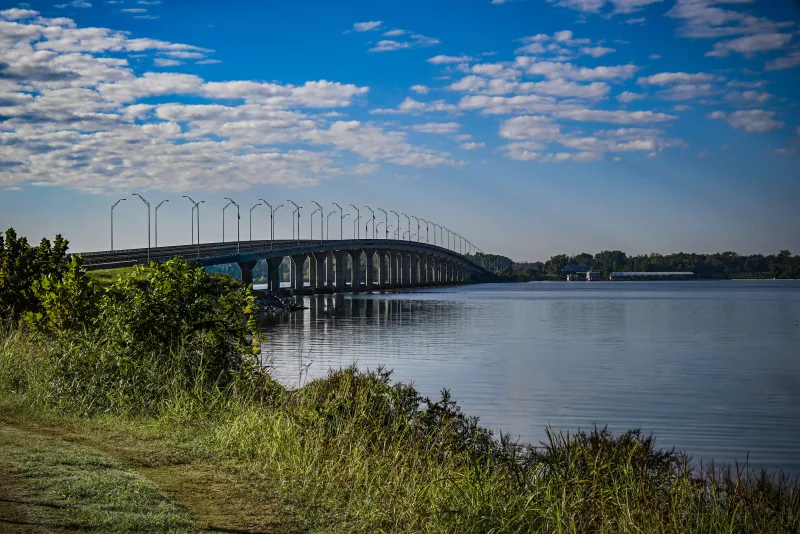 Sunset over Grand Lake reflecting on calm water